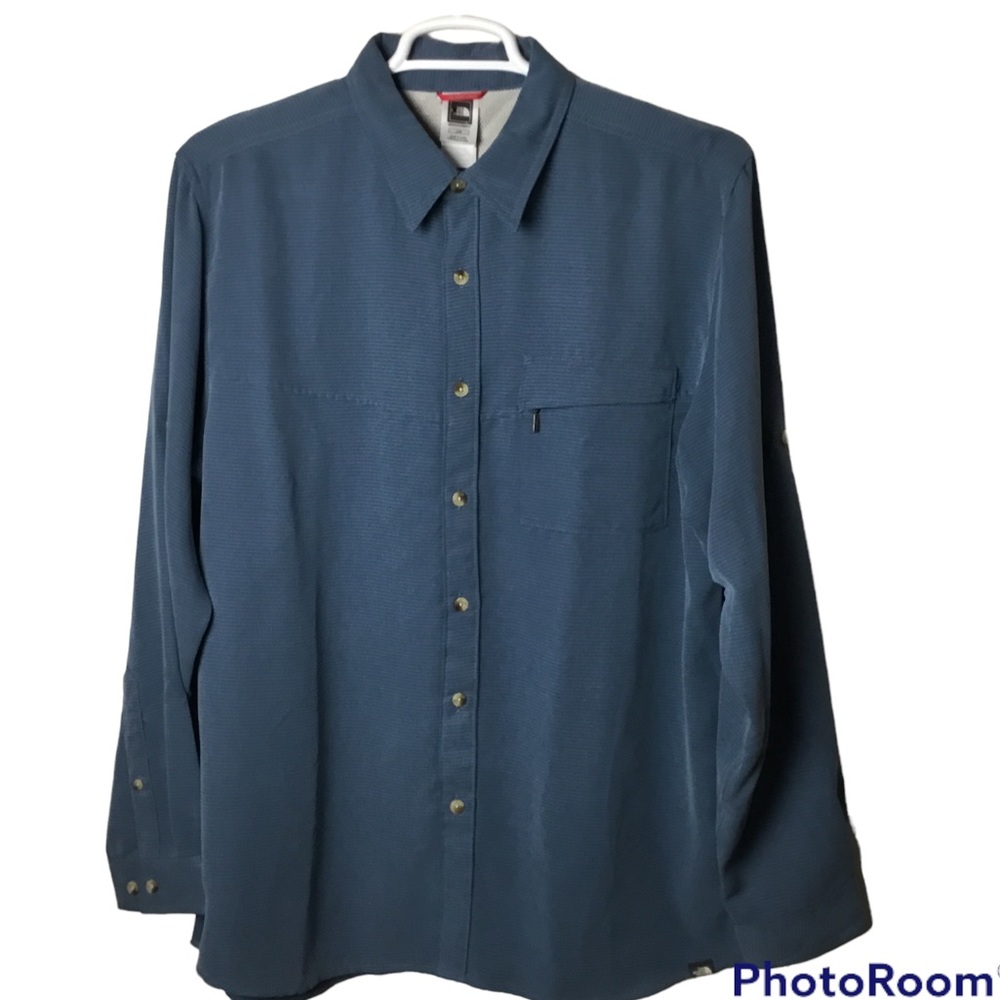 The North Face blue long sleeve button up shirt. Large